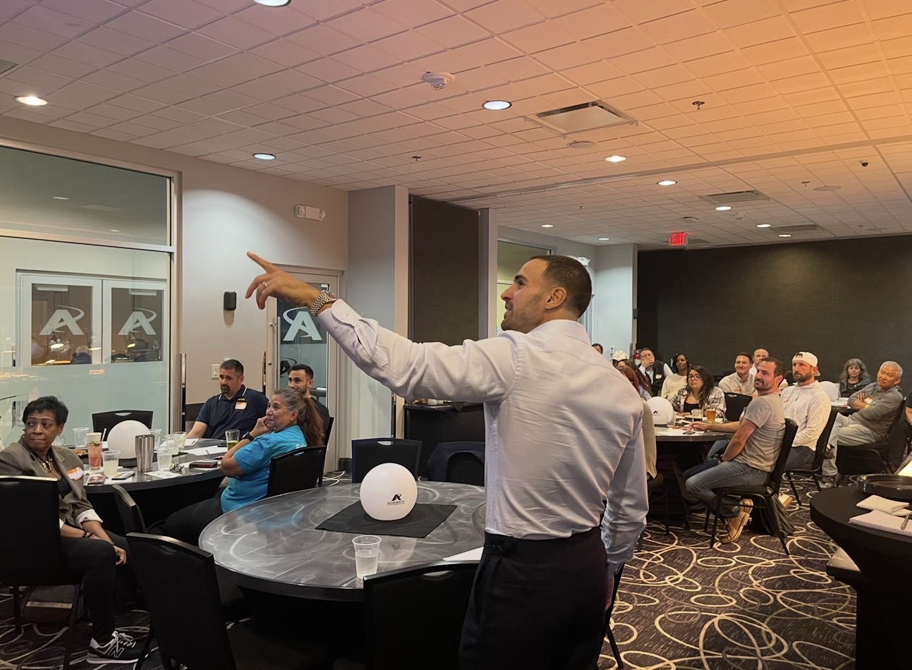 Dom facilitating a workshop with participants